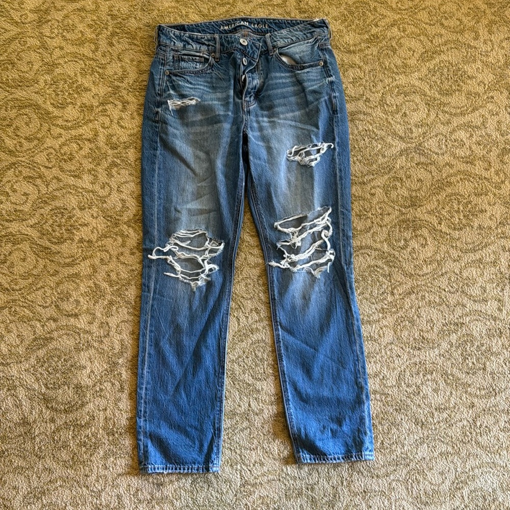 American Eagle women’s size four jeans with frayed design and button fly